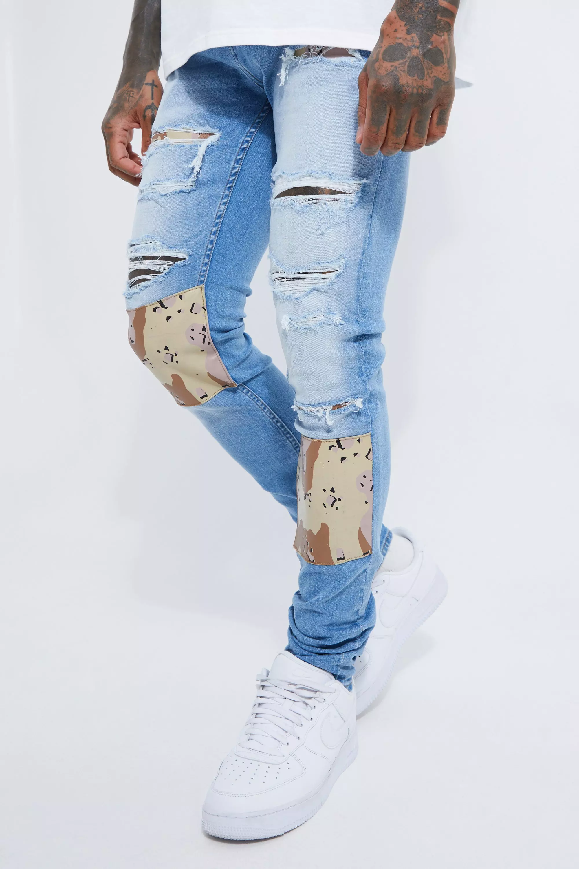 Mens ripped camo on sale jeans